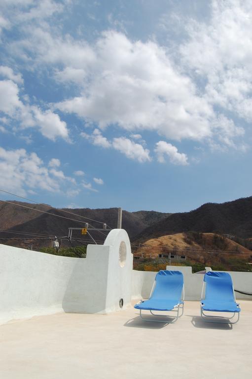 Отель Casa Bella Mya Таганга Экстерьер фото